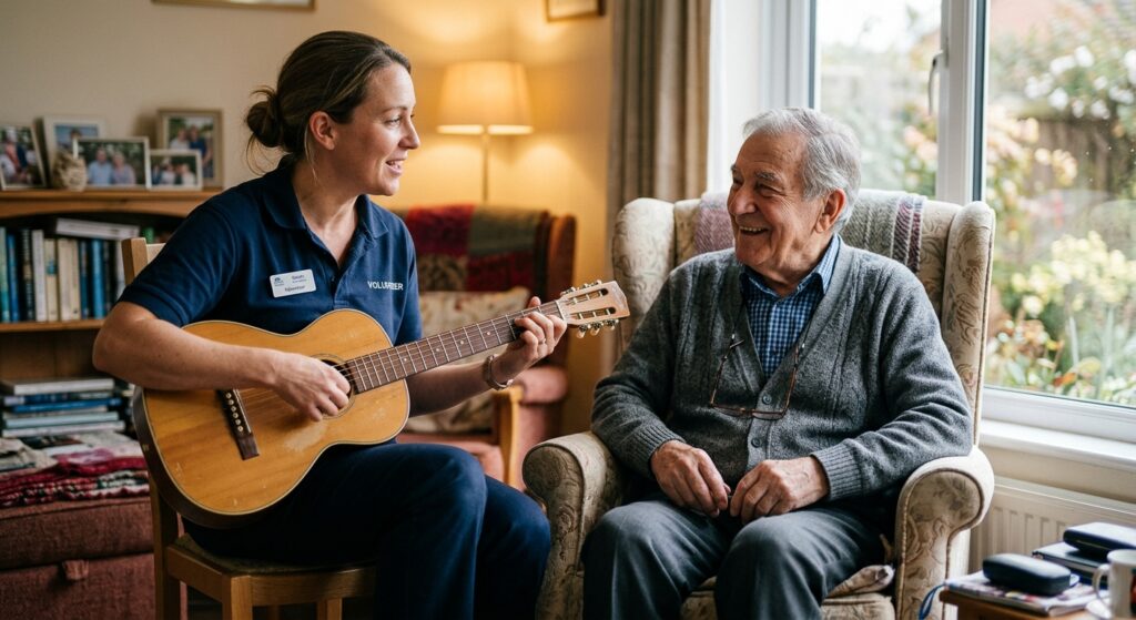 A therapeutic music session where a hospice volunteer plays a small guitar for a smiling senior, hea